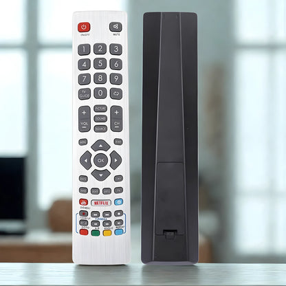 Sharp Aquos Ersatz Fernbedienung SHWRMC0115 Vorder- und Rückseite vor einem Wohnraum Hintergrund.