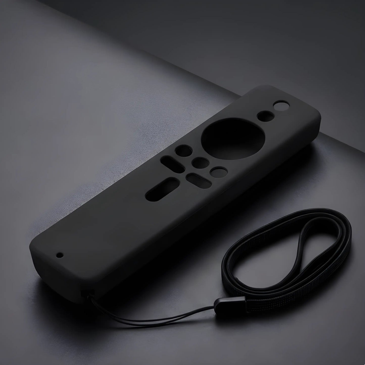 Hochwertiges Set bestehend aus schwarzer Silikonhülle und passender Trageschlaufe für Xiaomi Fernbedienungen.