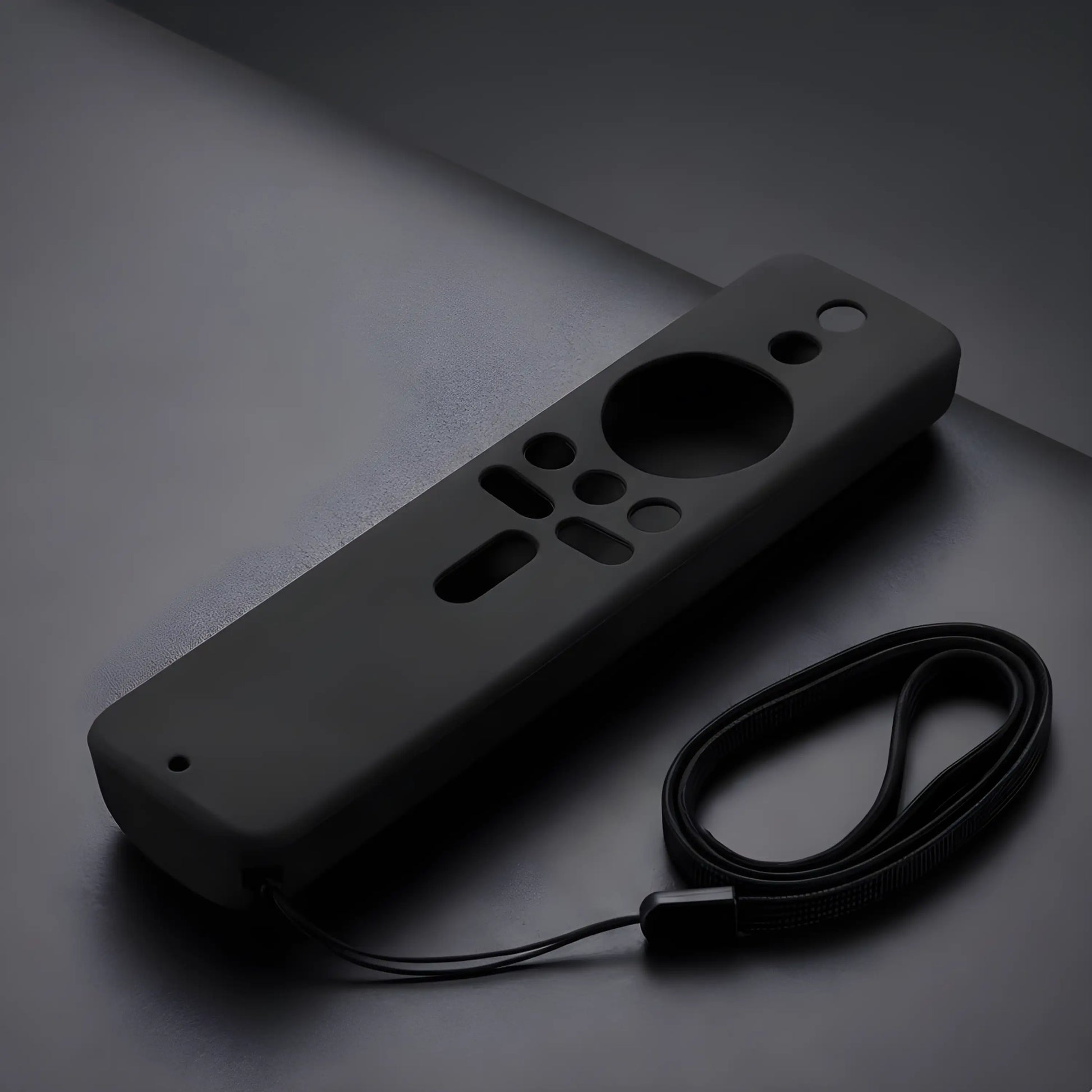 Hochwertiges Set bestehend aus schwarzer Silikonhülle und passender Trageschlaufe für Xiaomi Fernbedienungen.